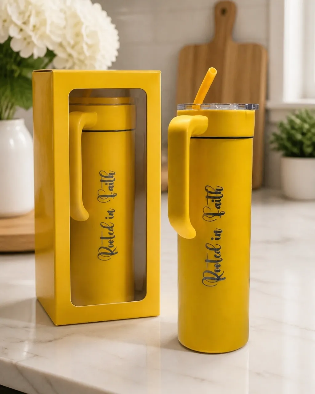 Rooted in Faith yellow engraved tumbler beside its matching gift box